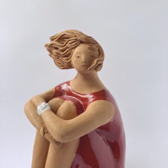 Rossa In Riva Con Bracciale Bianco