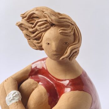 Rossa In Riva Con Bracciale Bianco