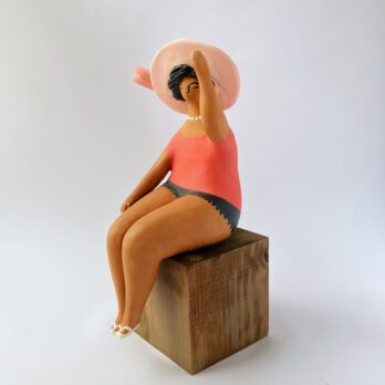 Marinella Figure of Woman Sitting in Pink With Hat