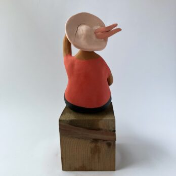 Marinella Figure of Woman Sitting in Pink With Hat