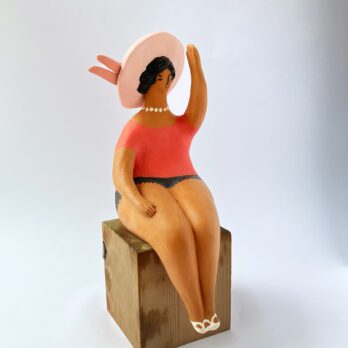 Marinella Figure of Woman Sitting in Pink With Hat